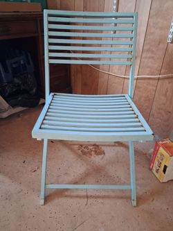Blue folding chair