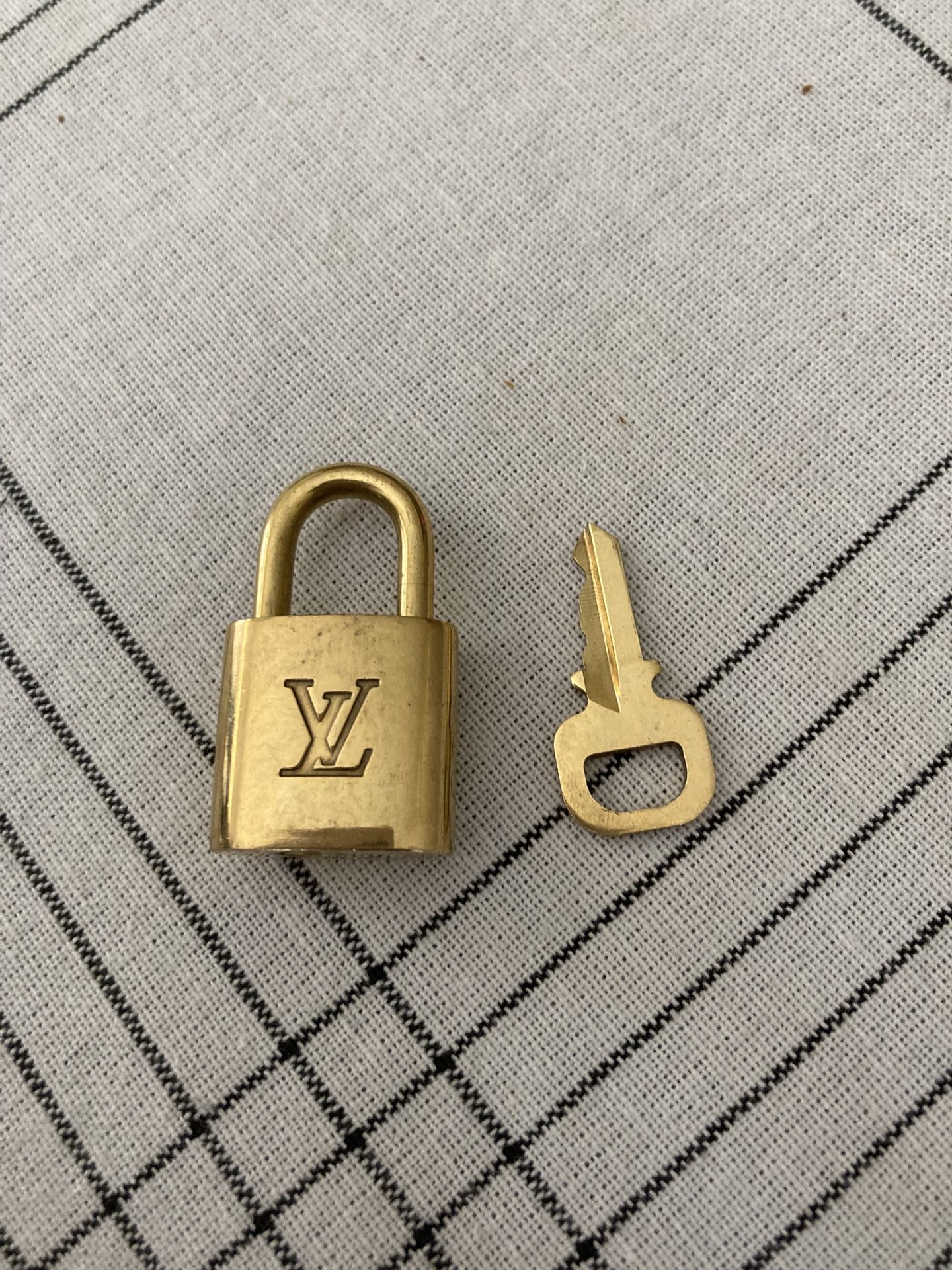 Louis Vuitton, padlock and key authentic