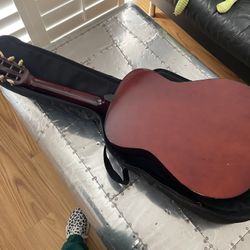 Acoustic Guitar And Case