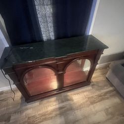 A marble cabinet case light up