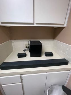 Black Soundbar System with Subwoofer and Rear Speakers