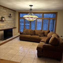 Custom 8 Seater Curved Sofa With leather Base And arms 