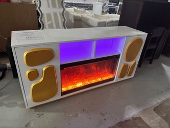 Brand new fireplace tv stand. White with gold accents.