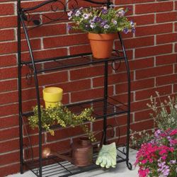 Best Garden Brand New ( In the box) 3 Shelf Plant Stand With Leaf Patter