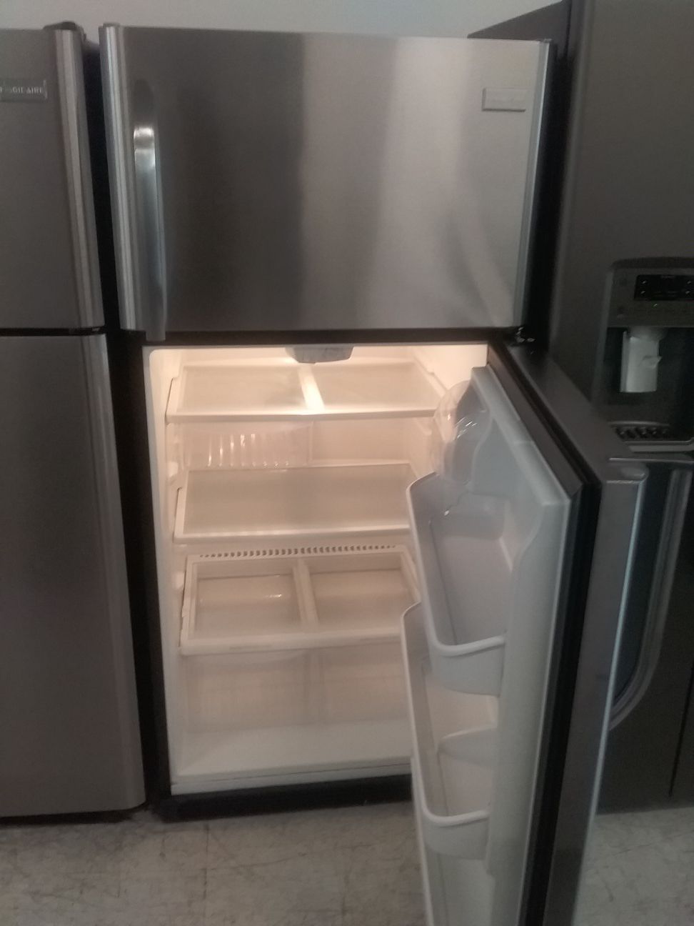 Frigidaire top and bottom stainless steel refrigerator used good condition 90days warranty