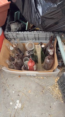 And assortment of glass bottles, variety colors