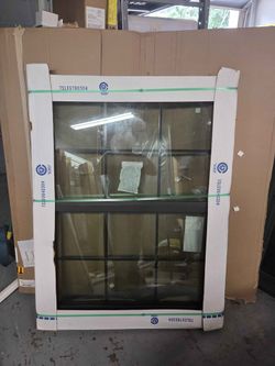 Brand New 32W x 51H PGT Aluminum Impact Window
