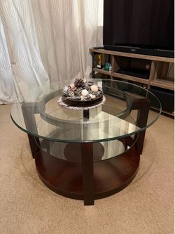 Dark wood with glass top coffee table