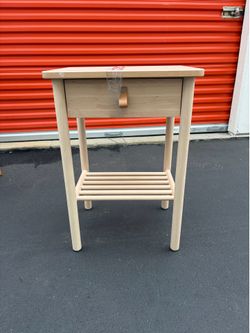 Small wooden bedside table