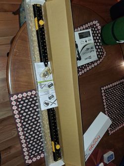 yoga mat, ruler, TV wall mount and puzzle mat