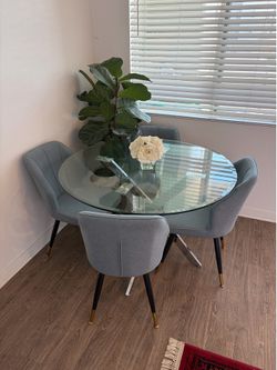 Dining glass table blue gold chairs
