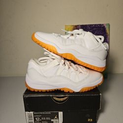 Size 12c - Citrus Jordan 11 Low's - $115