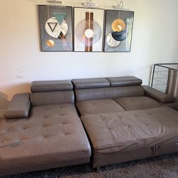 Taupe leather sectional sofa with storage