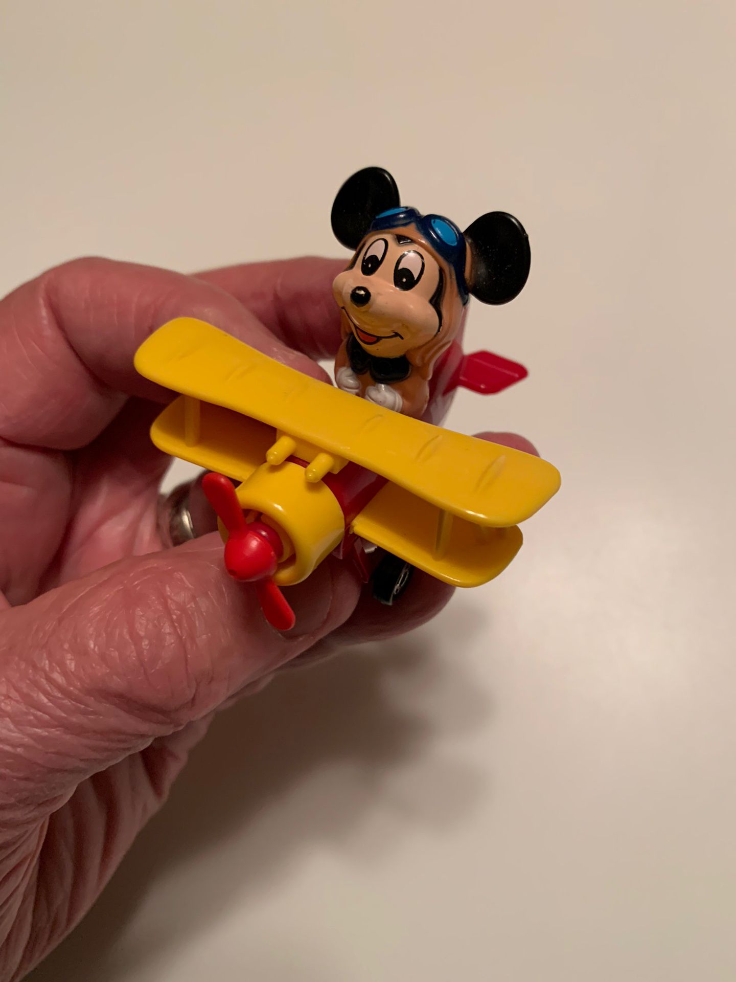 MICKEY MOUSE FLYING A BIPLANE No. PD-1 by TOMY TOYS