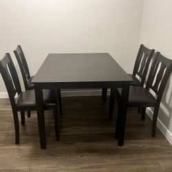 Fairly New Black Couch And 5 Piece Dining Set