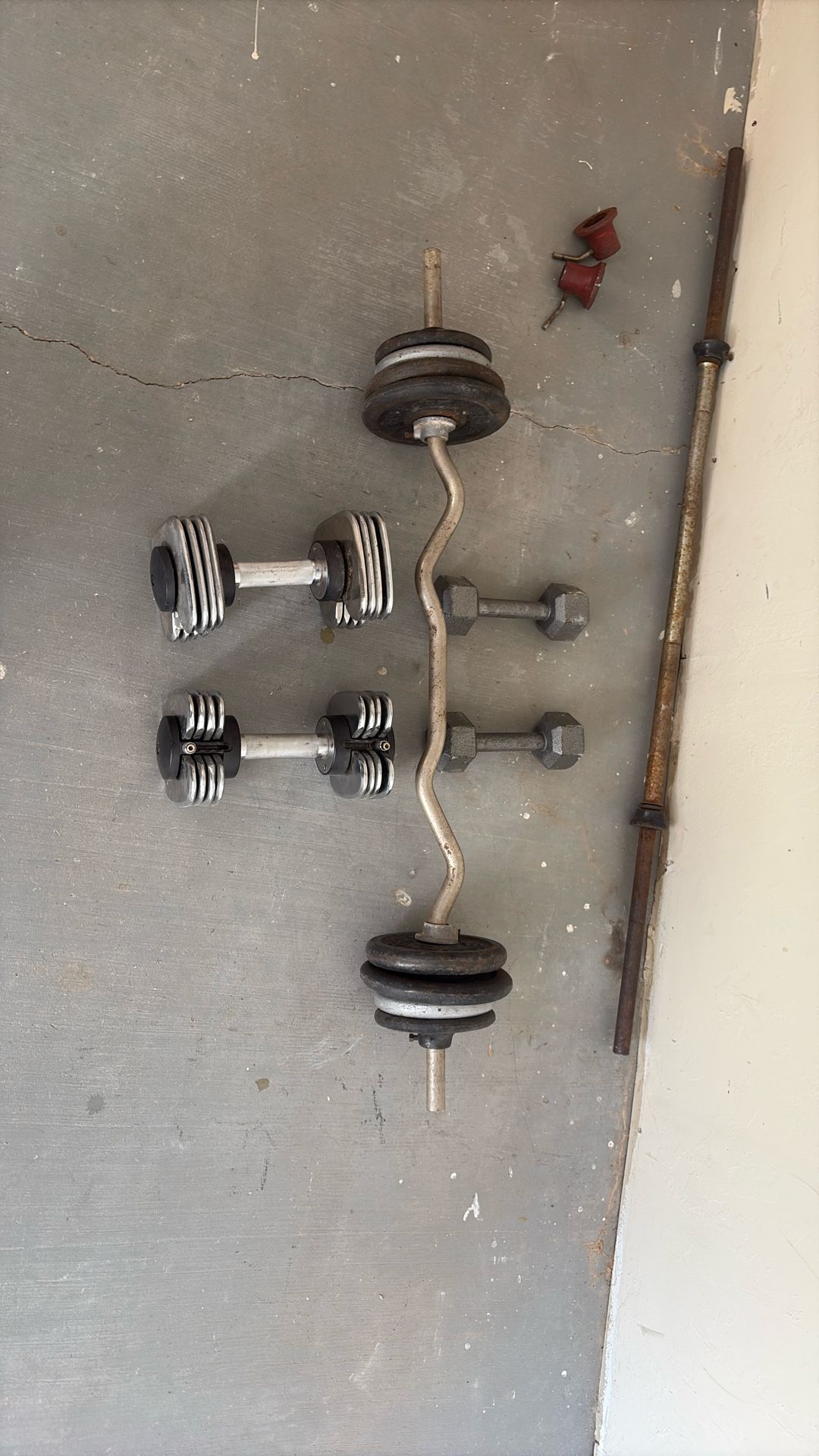 Ez curl bar And Adjustable Dumbbell’s