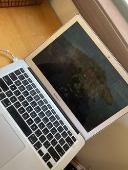 MacBook working plus charger
