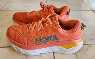 Women's HOKA Bondi 7 running shoes in the Camellia / Coastal Shade colorway,