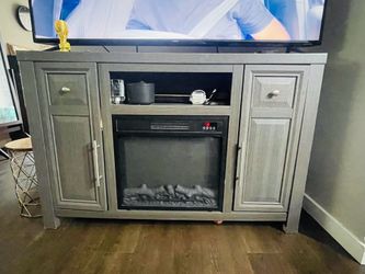 Gray farmhouse electric console gire place