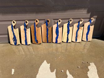 Maplewood charcuterie board with ocean blue epoxy resin