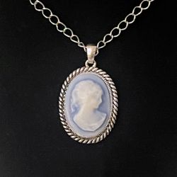 Vintage blue and white cameo necklace with silver tone chain 23” inches long chain 