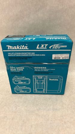 Makita 18 V rapid charger starter pack two batteries 4.0 ah and charge new inbox