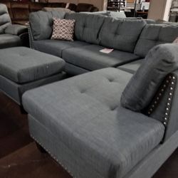 Gray sectional with pinheads