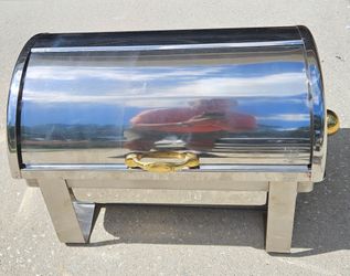 A full-size 8 Qt.rectangular stainless steel chafing dish featuring a 180-degree roll-top lid and decorative gold-accented handles. Designed for cater