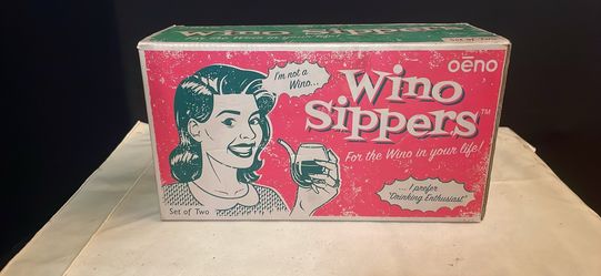 Vintage novelty "Wino Sippers" by OENO still in box never used as is. Pick up deliver.