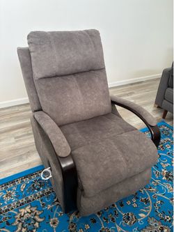 Two Gray Recliner Chairs
