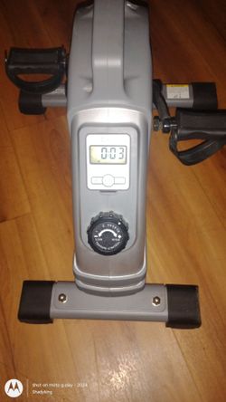Sunny Health & Fitness Magnetic Mini Exercise Bike (Model SF-B020026) in silver.