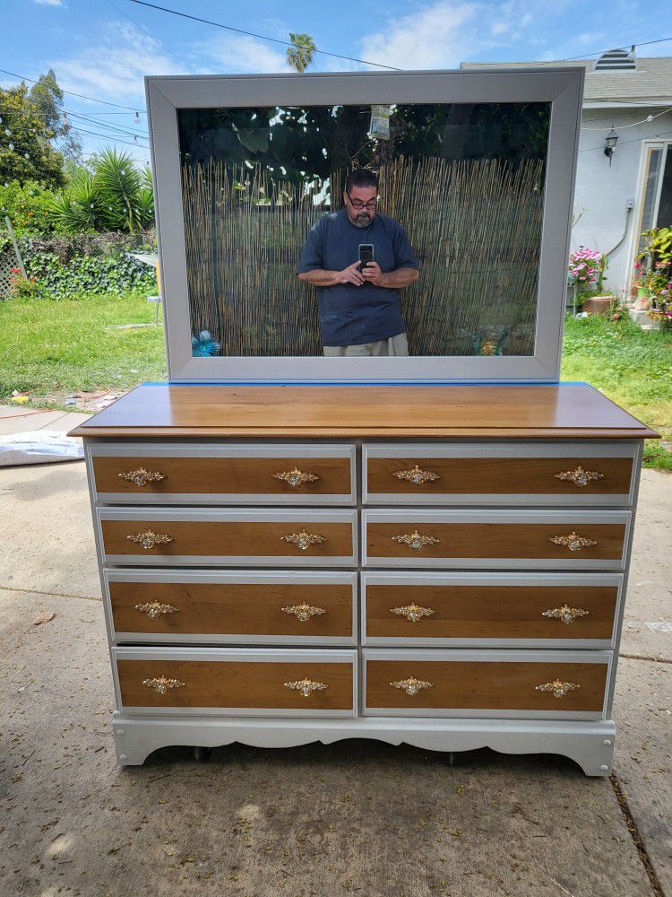 Vintage dresser with mirror.