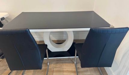 MOVE OUT SALE !Dining table with 4 chairs
