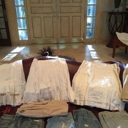 Cloths. All sizes: Teens To adult size 14 .I have boxes & boxes of cloths, dresses, tops ...Shoes, coats, jackets.... for sale.