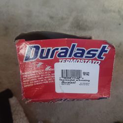 Duralast thermostat with housing