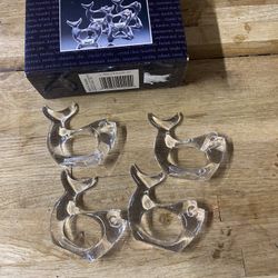 set of four clear acrylic whale-shaped napkin rings