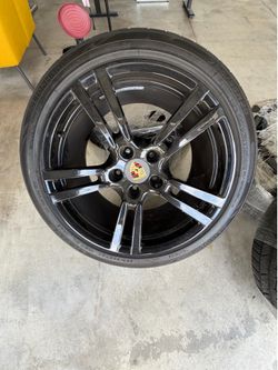orsche 20 Inch Wheels with 2  -295/35ZR20 Tires, 2-245/45R20 tires. Powder coated and are wrapped.