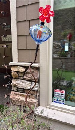Hand blown hummingbird feeder made by local artist