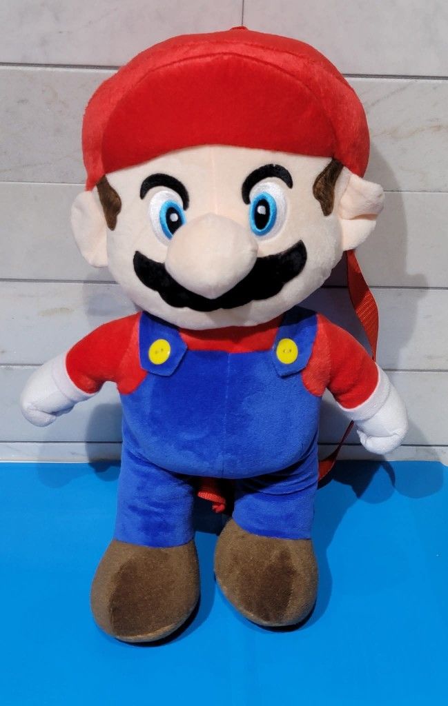 Super Mario Bros. Unisex 12.5" Plush Backpacks
$12 each (Two Available in Dark Blue and Two Available in Light Blue)