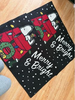 2 Gently used Snoopy Christmas rugs