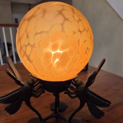 Vintage cast iron dragonfly lamp.
