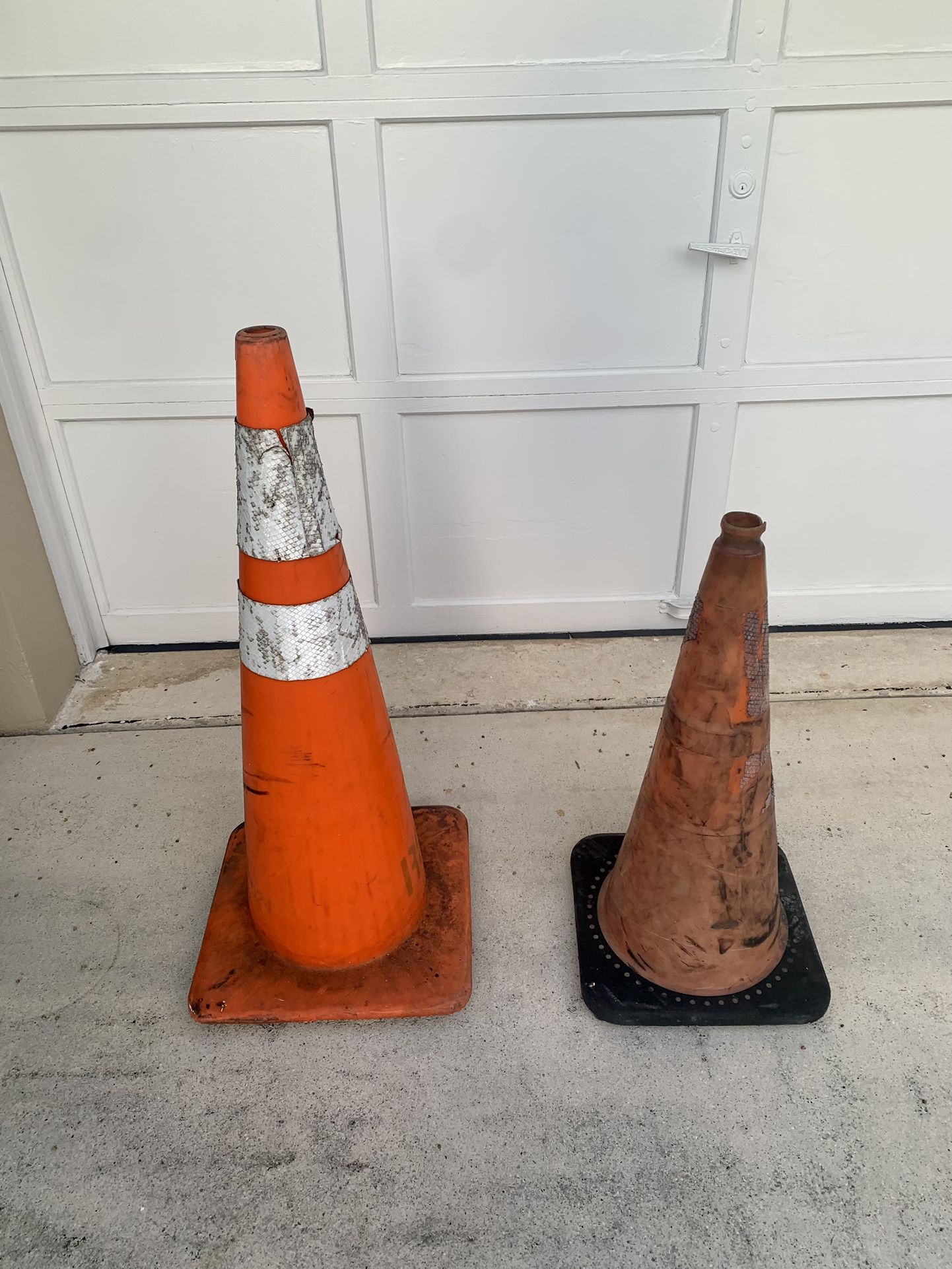 Preowned set of two orange construction cones