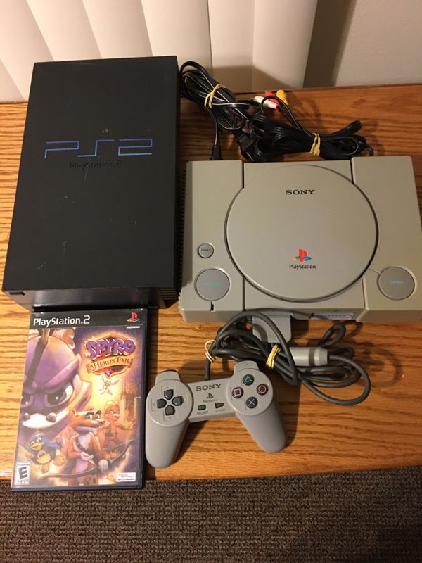 PlayStation 1 and 2, with ps2 game and ps1 controller