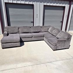 Gray sectional delivery available