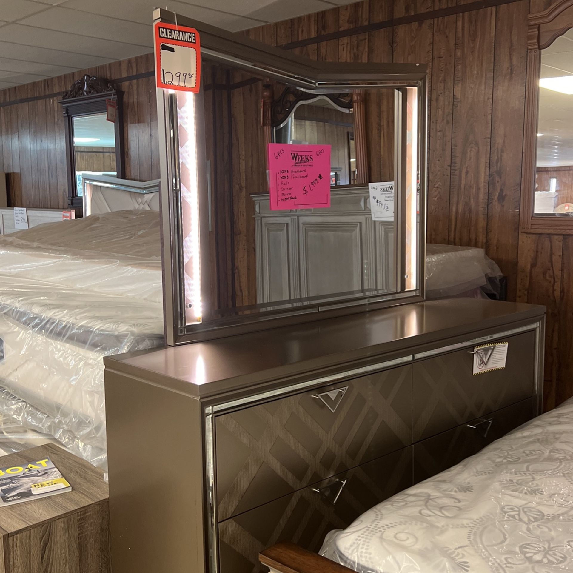 Brand new king headboard, footboard rails with drawers, nightstand, and dresser and mirror $2000