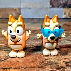 2-Lot Bluey Action Figures From The Animated Bluey Series • Figures Are Of Bingo Heeler & Another Bingo Heeler Wearing Swim Movable Blue Goggles 
