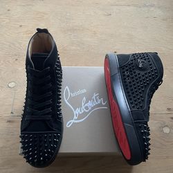 High top Christian Louboutin red bottoms