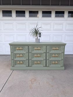 Beautiful sage green dresser with gold hardware
