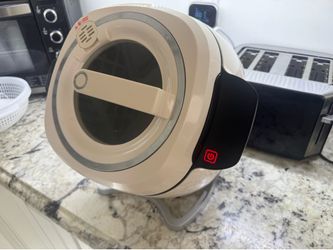 Automatic stirfry machine The 6L Full Automatic Intelligent Cooking Machine is a revolutionary kitchen appliance designed to simplify your cooking exp