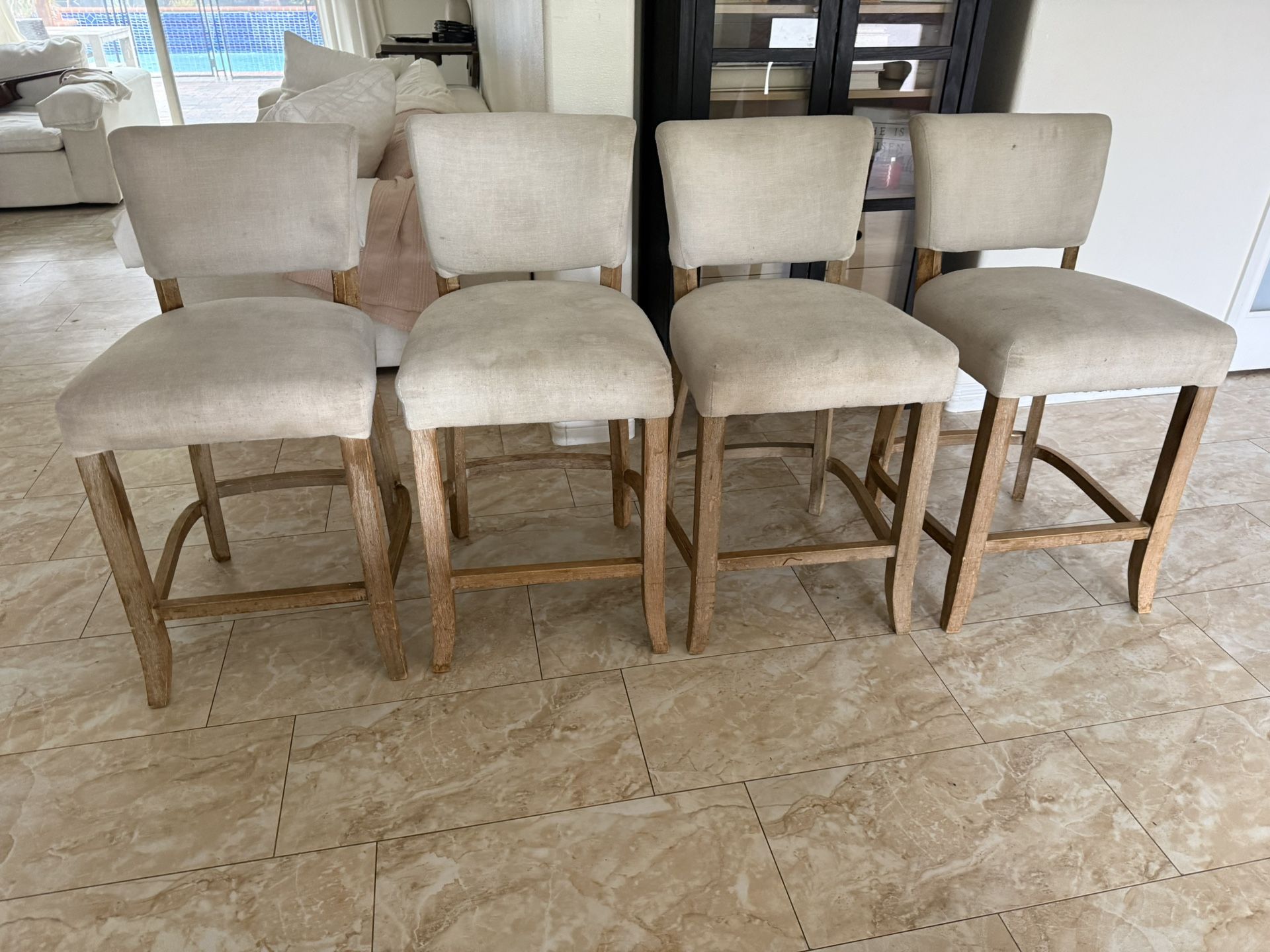 linen upholstered counter / bar stool with wooden legs